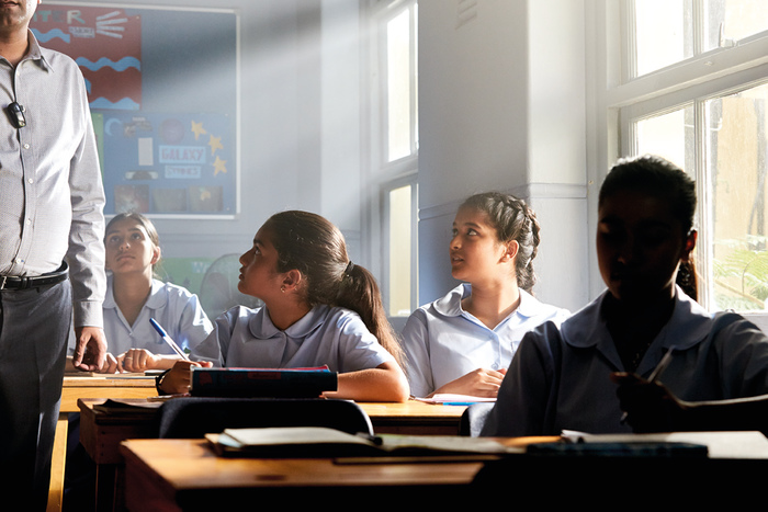 girl learning in classroom