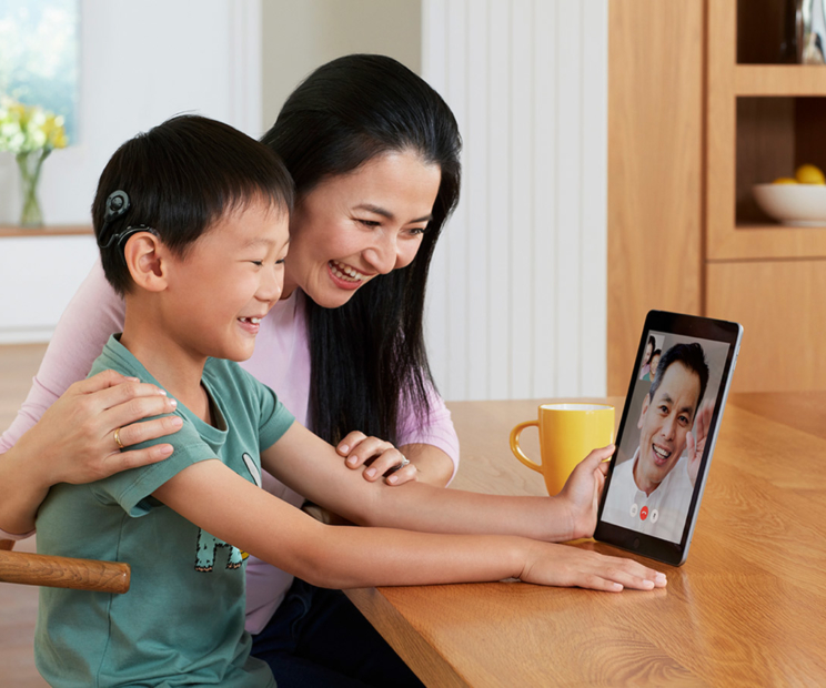 boy and mom facetiming